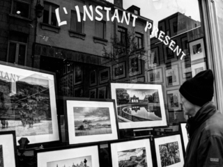 Art Lover An art lover watching the window of a shop in Brussels.