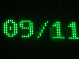 9/11, of course, captures the imagination, but in reality this is just the digital clock on the facade of a local pharmacy, and the photo was taken on November the 9th.