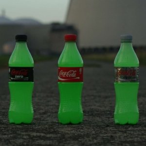 Nuclear coke is a sub-series of photos where different bottles of Coca Cola are placed in the vicinity of a nuclear power plant with the typical cooling towers. In this case it's the nuclear power plant of Doel near Antwerp. No photo editing was applied here. The bottles are real and are containing green Halloween make-up that Ghost dissolved in water. The three bottles can still be found in Ghost's house today, in the bathroom somewhere on top of a cupboard.