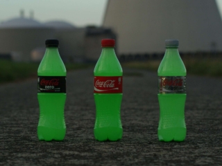 Nuclear coke is a sub-series of photos where different bottles of Coca Cola are placed in the vicinity of a nuclear power plant with the typical cooling towers. In this case it's the nuclear power plant of Doel near Antwerp. No photo editing was applied here. The bottles are real and are containing green Halloween make-up that Ghost dissolved in water. The three bottles can still be found in Ghost's house today, in the bathroom somewhere on top of a cupboard.