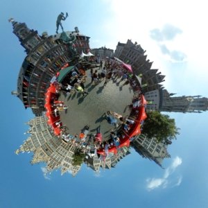 This Tiny Planet shows The Grote Markt, the central square of Antwerp, Belgium, situated in the heart of the old city quarter. It is surrounded by the city's Renaissance Town Hall, as well as numerous guildhalls with elaborate façades. The square also has many restaurants and cafes, and it lies within walking distance of the Scheldt river and the cathedral. The original photo was taken in 2017 during the now sadly defunct annual culture market on the last weekend of August.