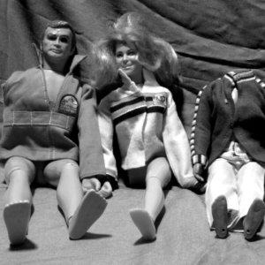 Handicapped dolls. The six-million-dollar man with an arm missing, the bionic woman with one leg missing, and poor Ken will never see Barbie again, because he's lost his head.